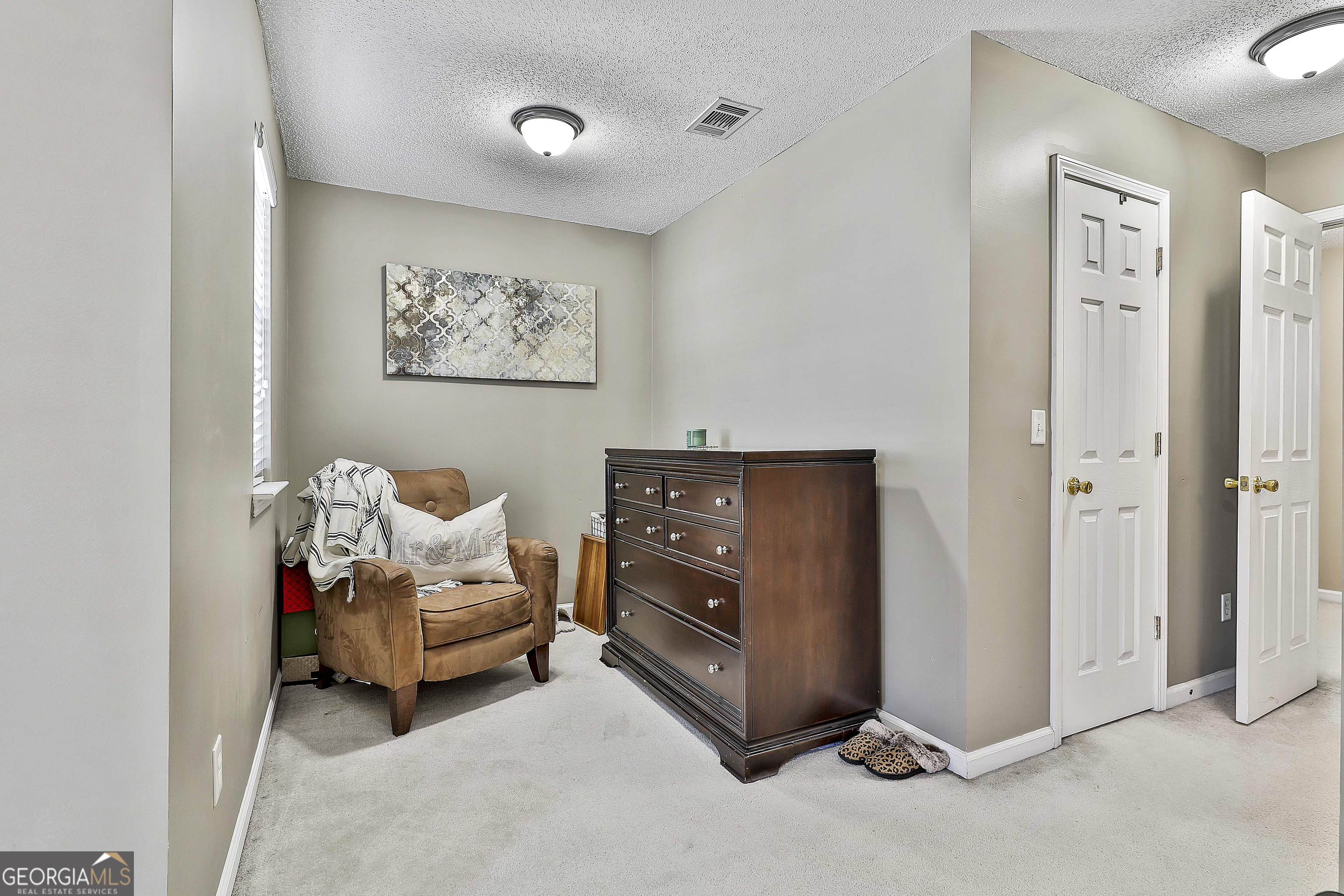 7759 Bucknell Terrace Fairburn, GA 30213 - Photo 14 of 26 a living room with furniture