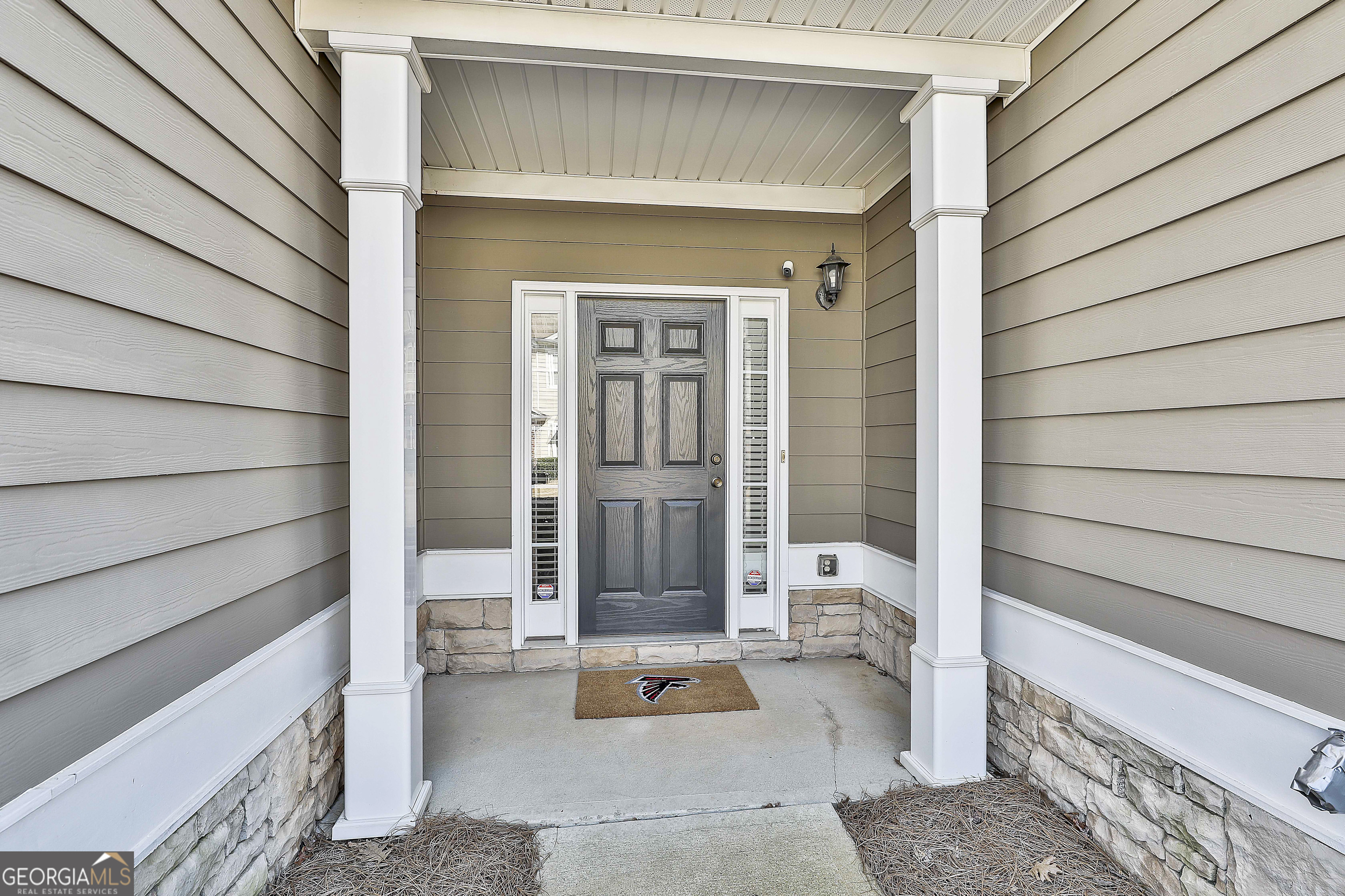 7759 Bucknell Terrace Fairburn, GA 30213 - Photo 4 of 26 a front view of a house with a bathtub