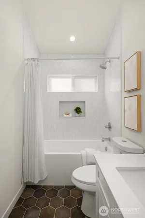 a view of a backyard with brick wall