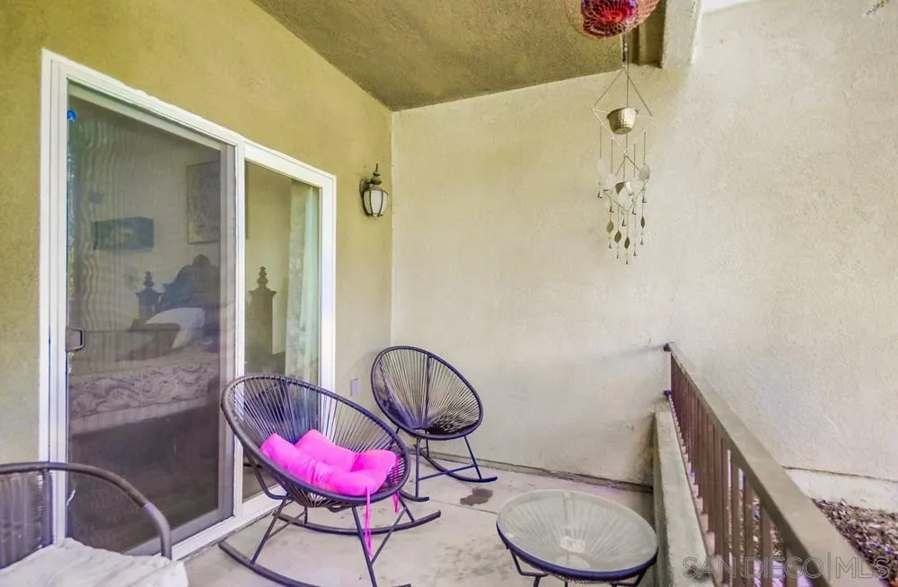 9728 Marilla Drive, Unit 312 Lakeside, CA 92040 - Photo 16 of 28 a living room with furniture and a potted plant