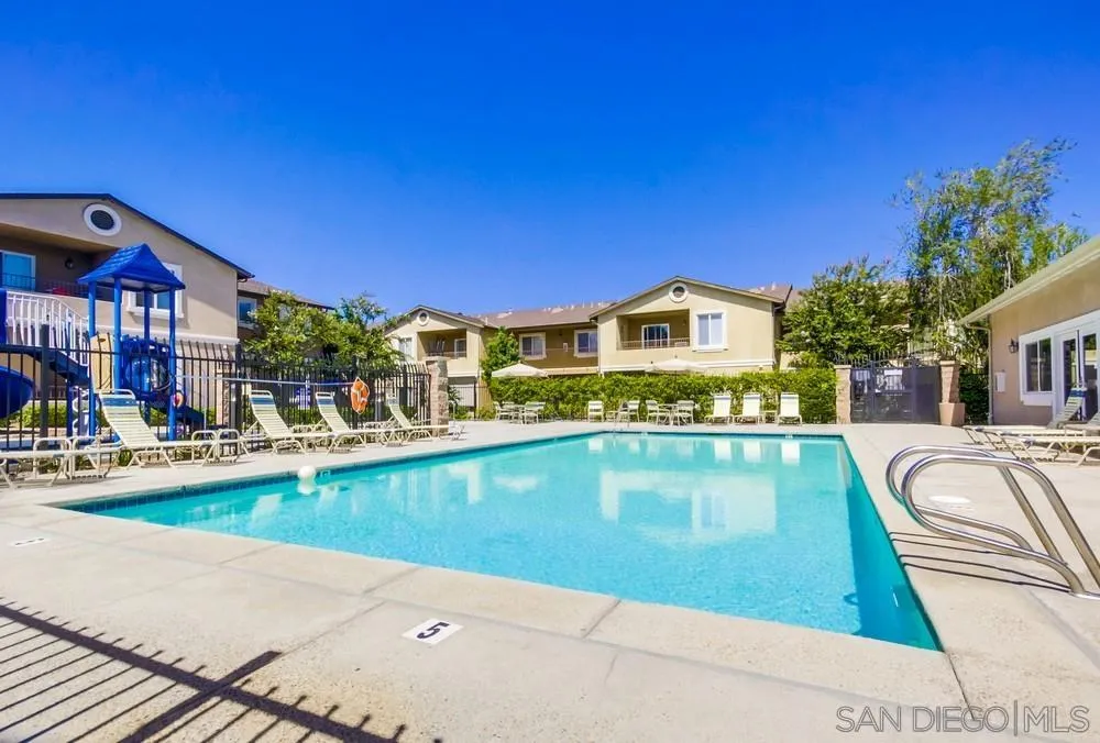 9728 Marilla Drive, Unit 312 Lakeside, CA 92040 - Photo 26 of 28 a view of a house with a swimming pool