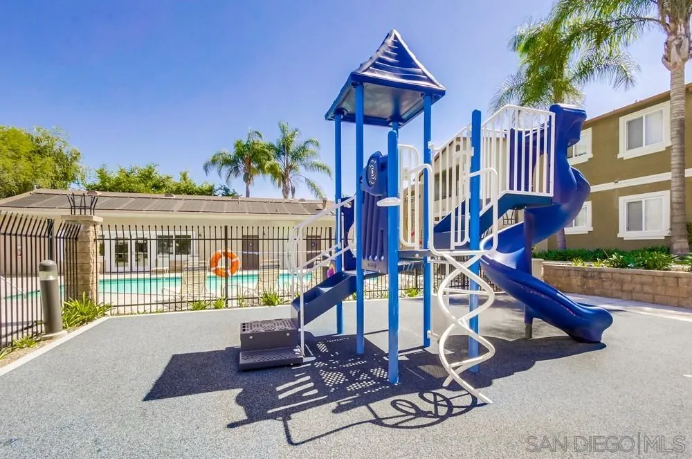 9728 Marilla Drive, Unit 312 Lakeside, CA 92040 - Photo 28 of 28 a view of a house with a swimming pool and sitting area