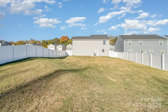 a view of a swimming pool with an outdoor seating