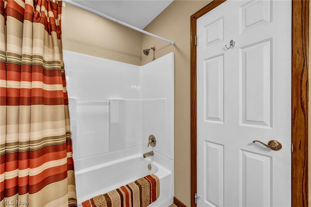 1057 Congress Lake Road Mogadore, OH 44260 - Photo 22 of 50 Full bathroom on the first floor near the secondary bedrooms
