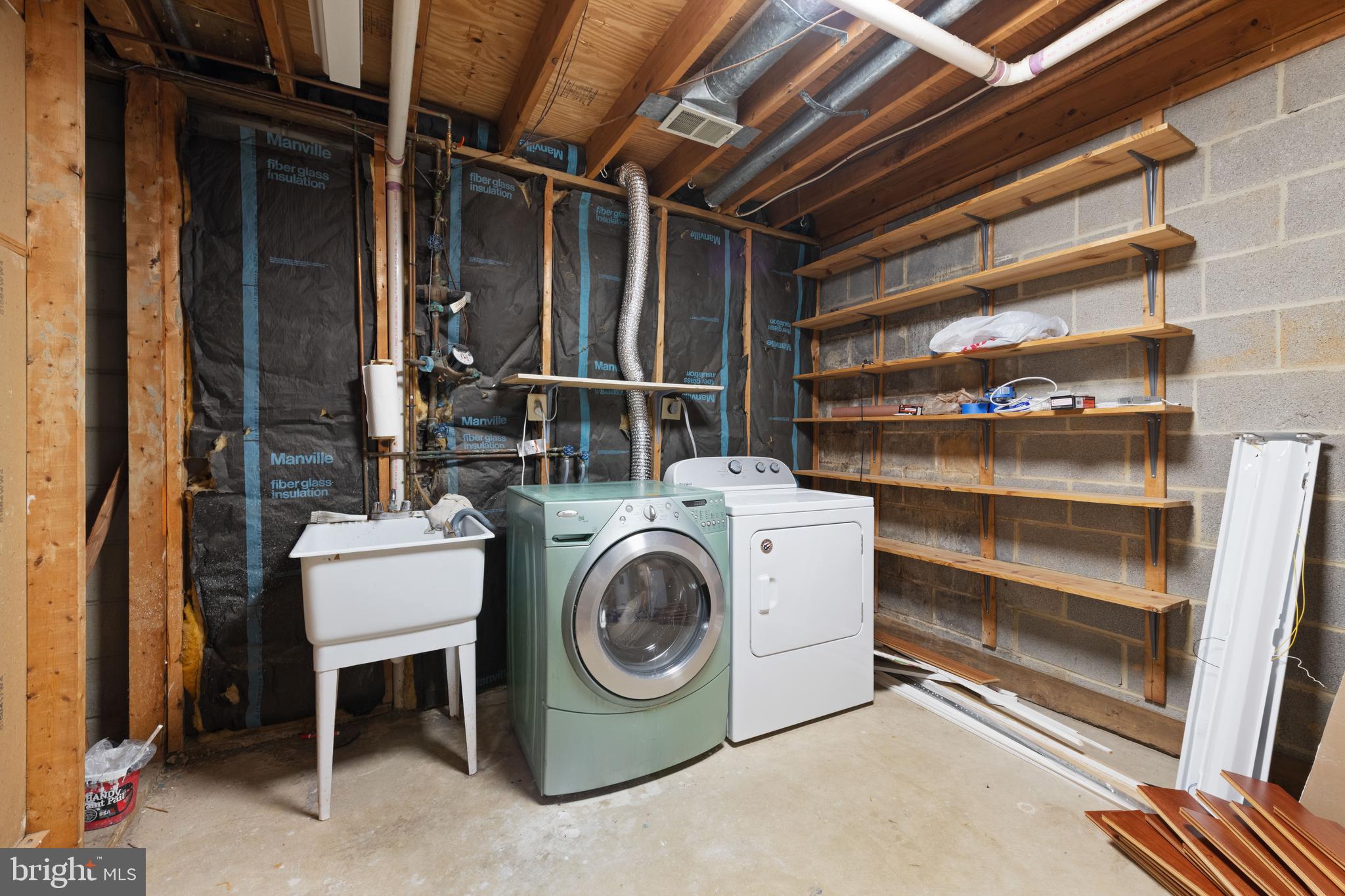 11321 Crescendo Place Silver Spring, MD 20901 - Photo 20 of 24 a utility room with dryer and washer