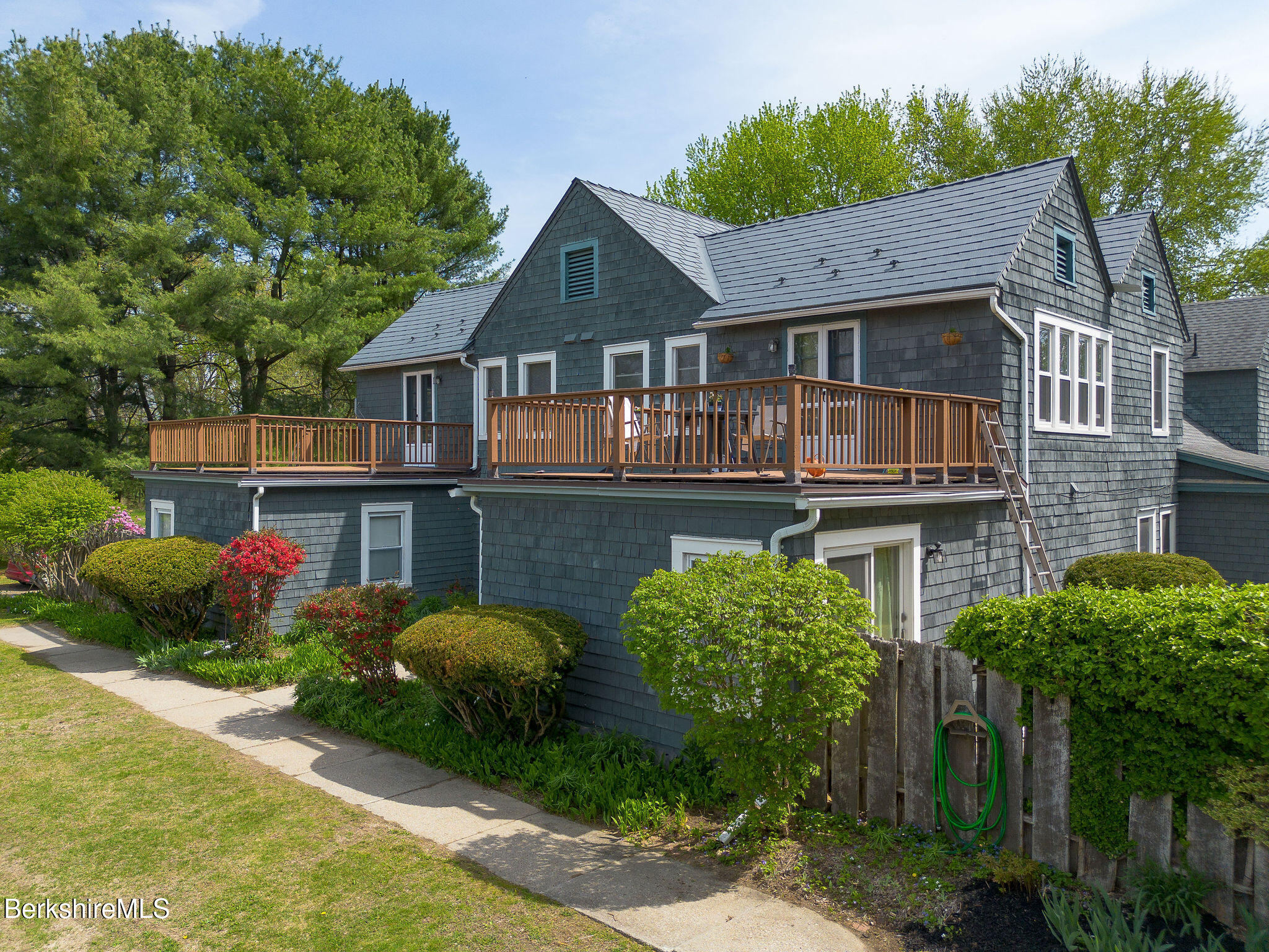 567 South Main Street Sheffield, MA 01257 - Photo 1 of 70 a front view of a house with garden