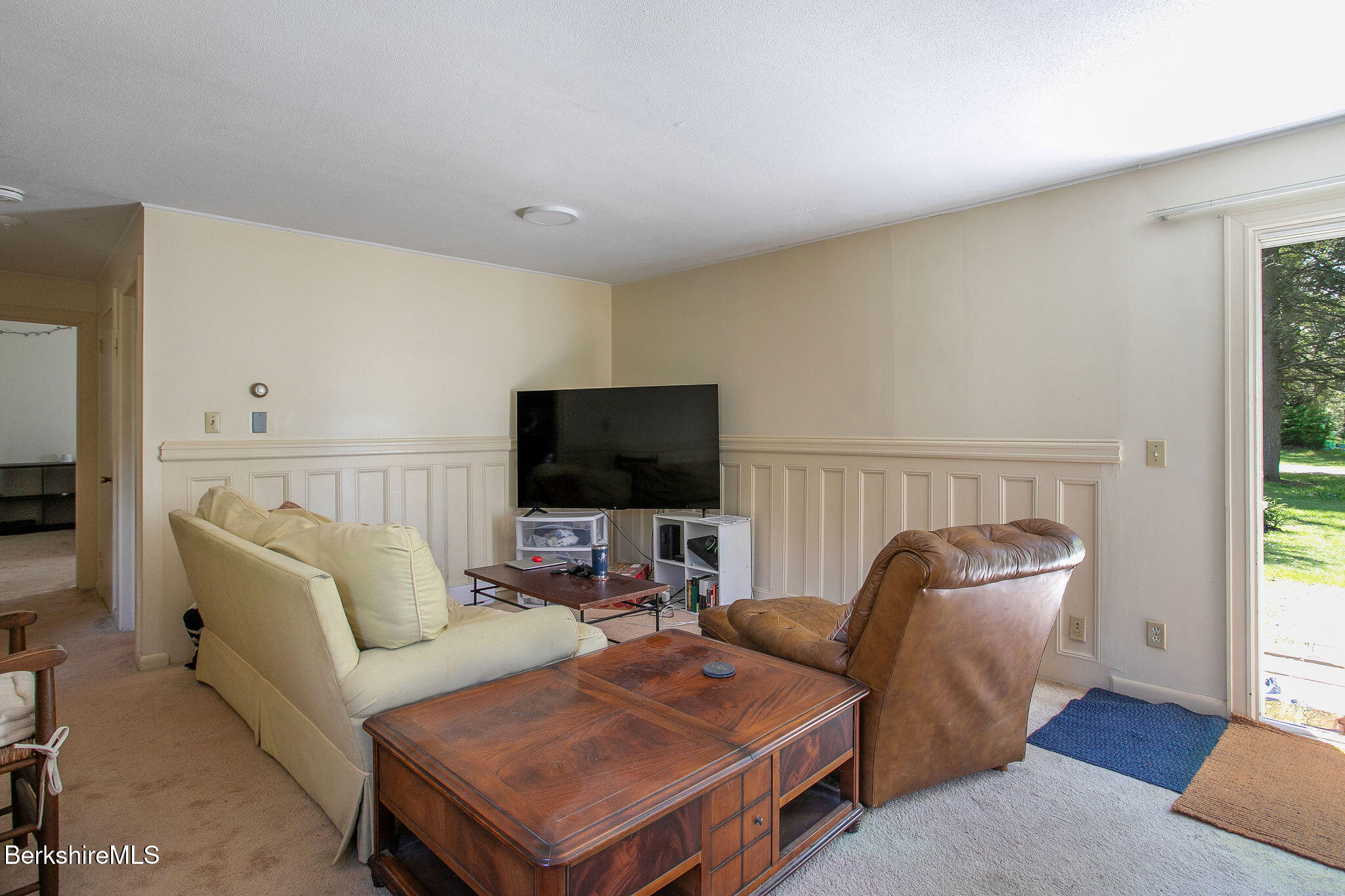 567 South Main Street Sheffield, MA 01257 - Photo 19 of 70 a living room with furniture and a flat screen tv