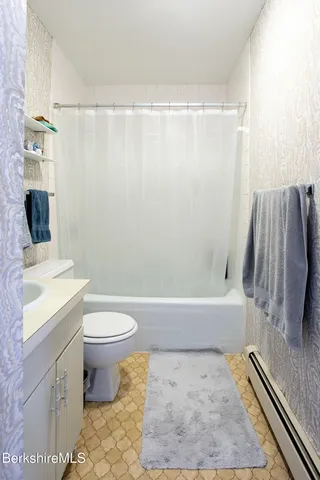 a bathroom with a sink and a bathtub