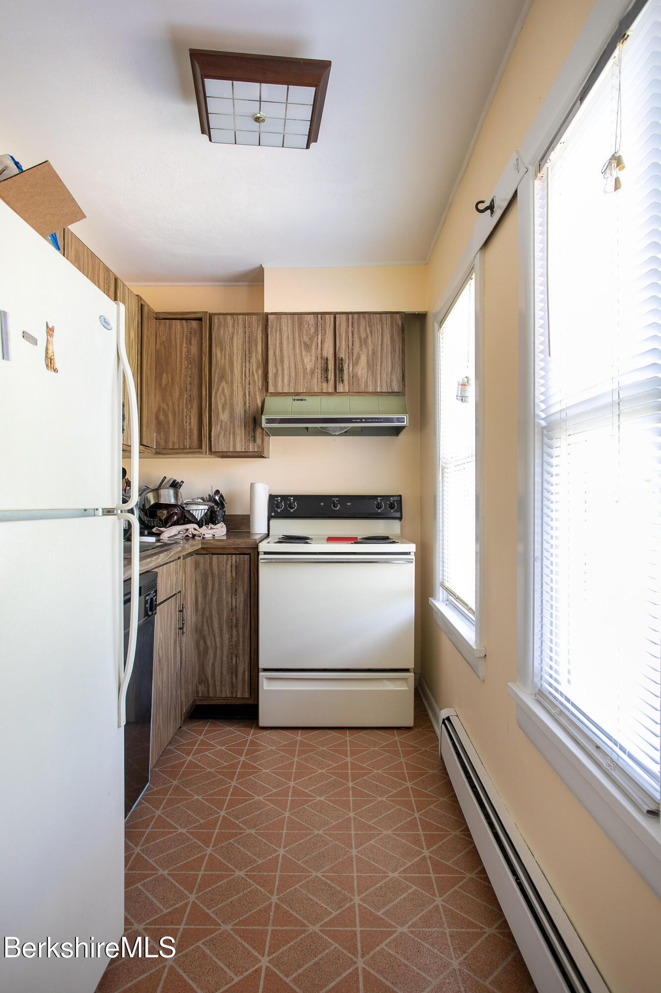 567 South Main Street Sheffield, MA 01257 - Photo 35 of 70 a kitchen with a white cabinets and white appliances