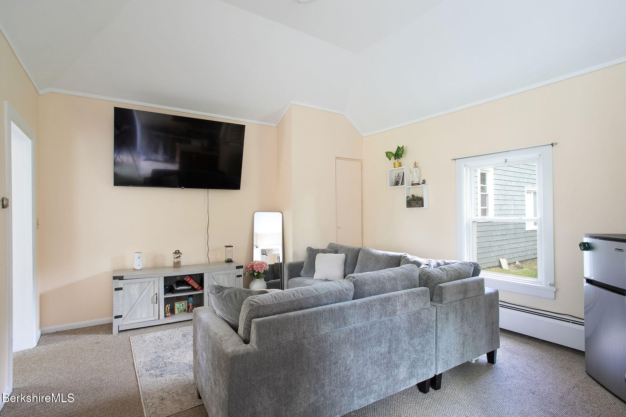 567 South Main Street Sheffield, MA 01257 - Photo 38 of 70 a living room with furniture a flat screen tv and a window