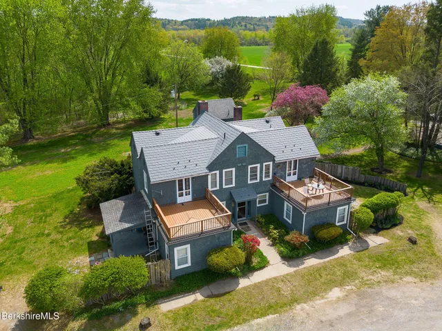 a view of a lake with a yard