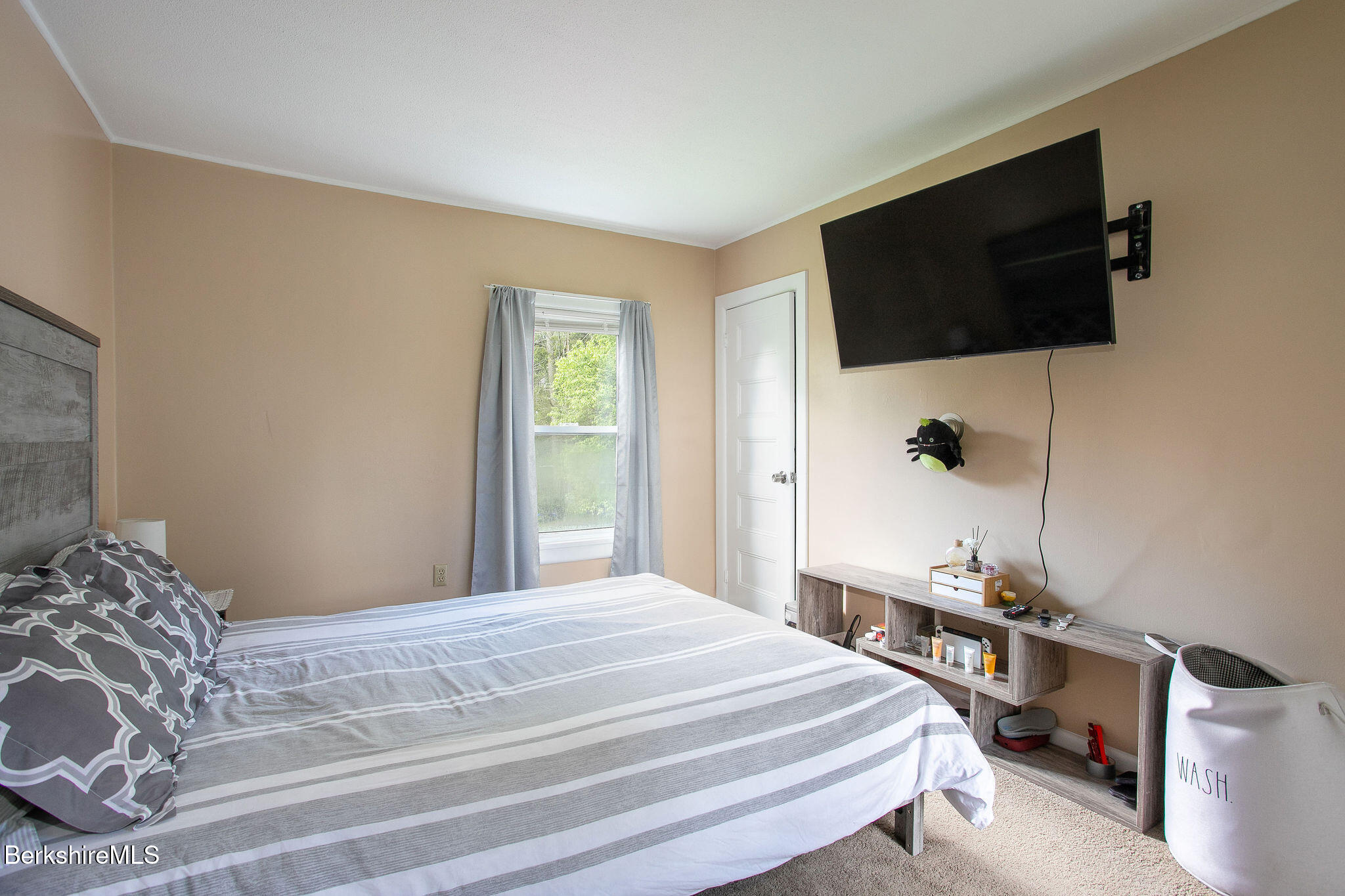 567 South Main Street Sheffield, MA 01257 - Photo 44 of 70 a bedroom with a bed tv and a window