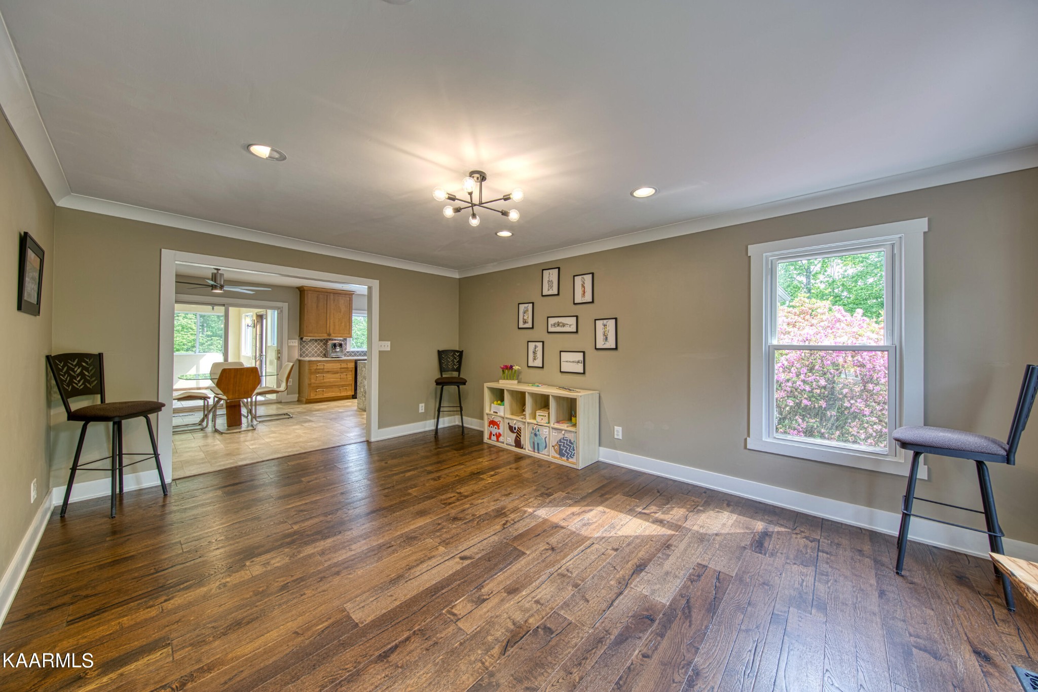 2313 Tooles Bend Road Knoxville, TN 37922 - Photo 11 of 50 a view of an empty room with wooden floor and a window