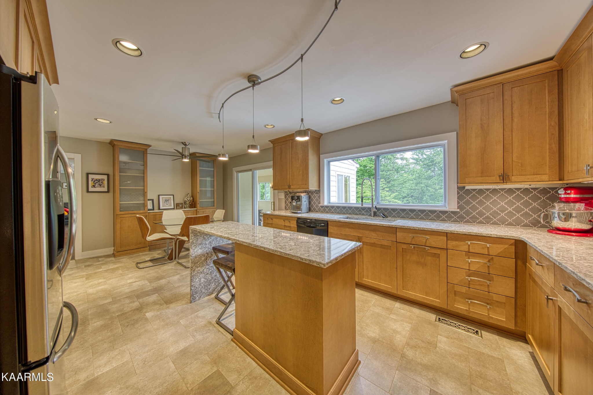 2313 Tooles Bend Road Knoxville, TN 37922 - Photo 18 of 50 a kitchen with stainless steel appliances granite countertop sink stove and refrigerator