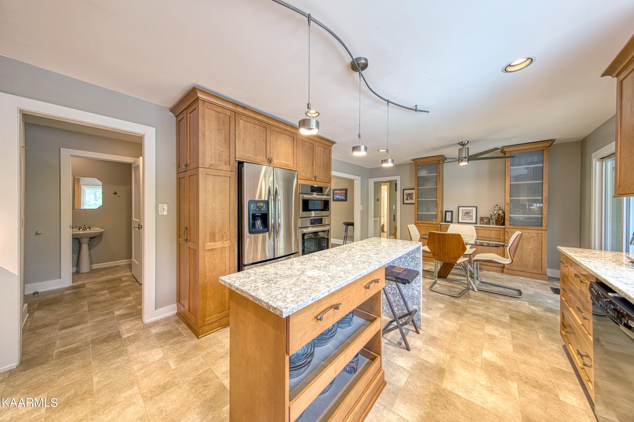 2313 Tooles Bend Road Knoxville, TN 37922 - Photo 19 of 50 a living room with stainless steel appliances kitchen island granite countertop furniture and a kitchen view