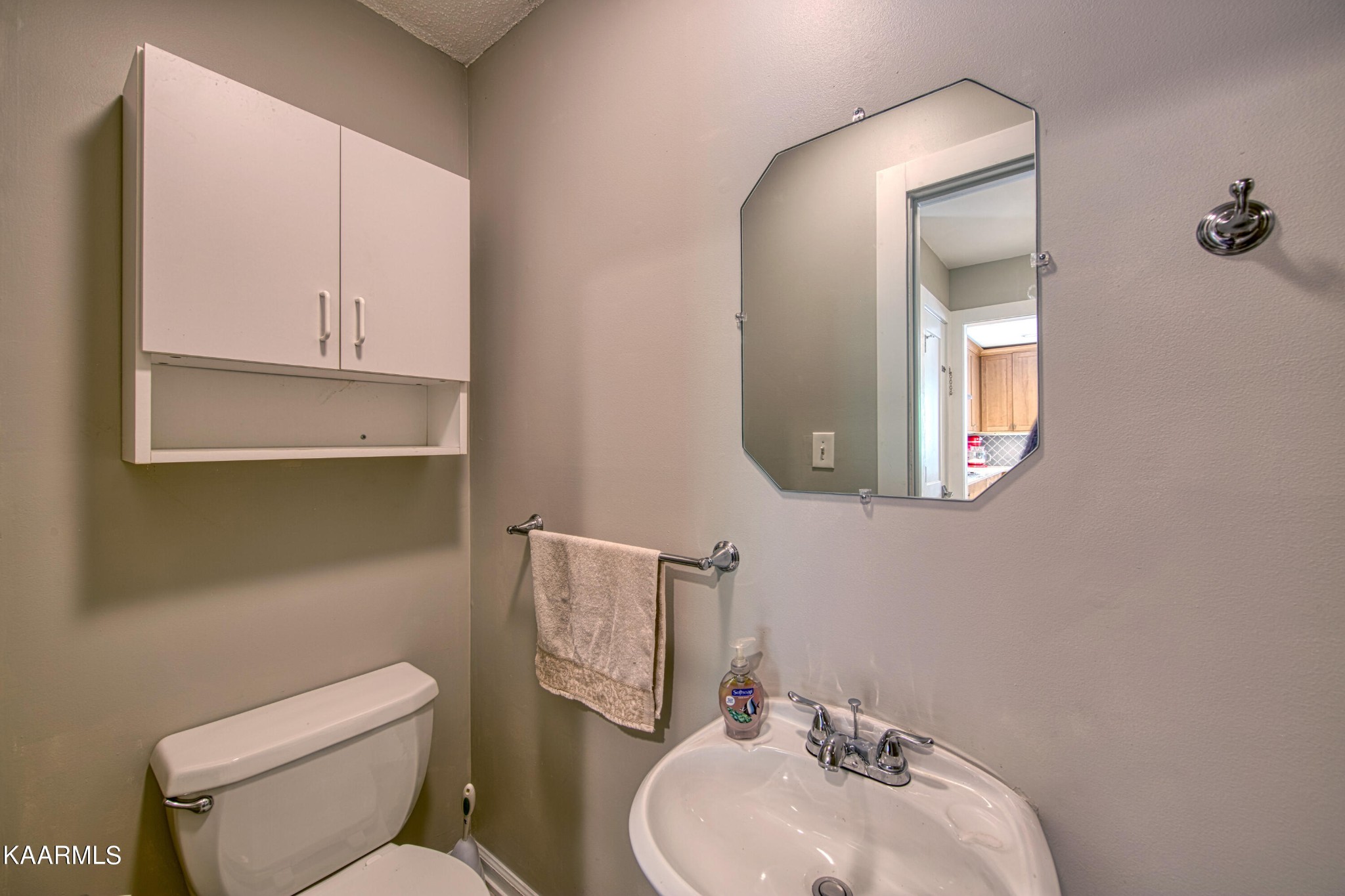 2313 Tooles Bend Road Knoxville, TN 37922 - Photo 20 of 50 a bathroom with a toilet sink and mirror