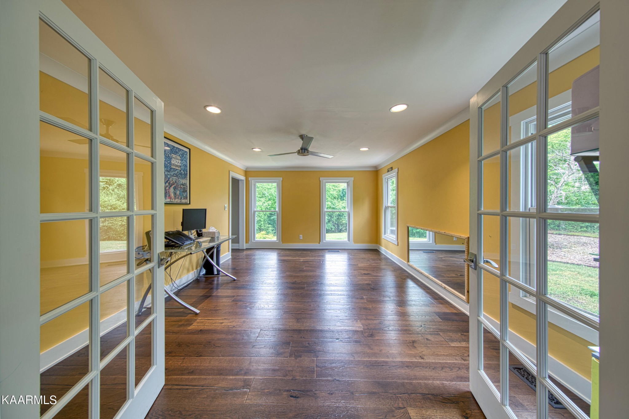 2313 Tooles Bend Road Knoxville, TN 37922 - Photo 26 of 50 a view of a living room with a large window and wooden floor