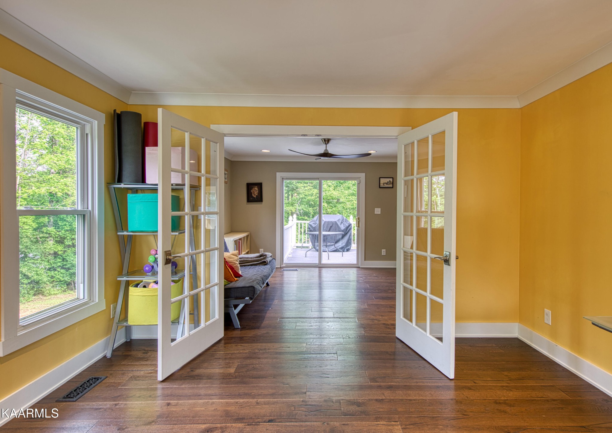 2313 Tooles Bend Road Knoxville, TN 37922 - Photo 27 of 50 a view of empty room with wooden floor and fan