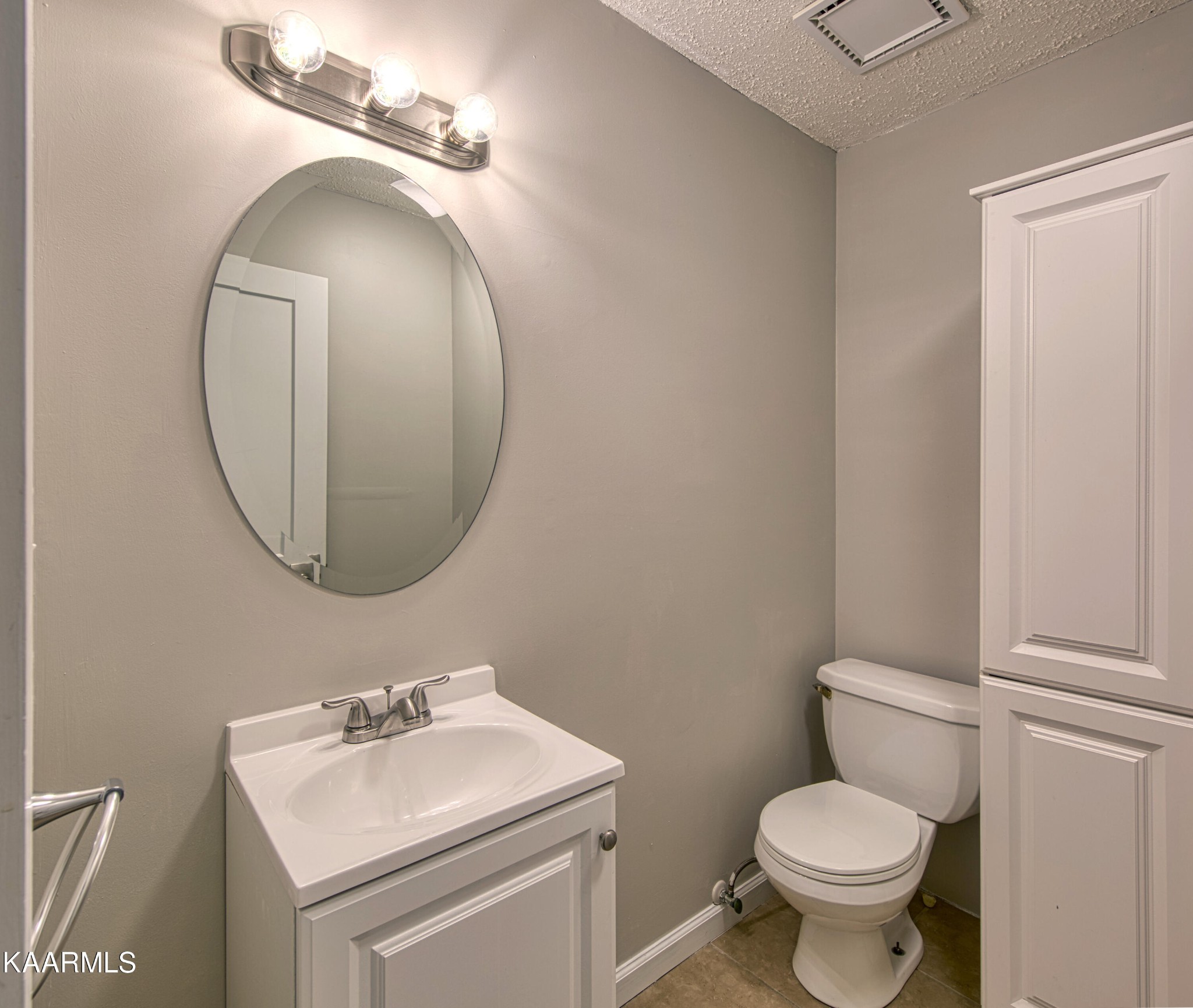 2313 Tooles Bend Road Knoxville, TN 37922 - Photo 28 of 50 a bathroom with a toilet sink and mirror