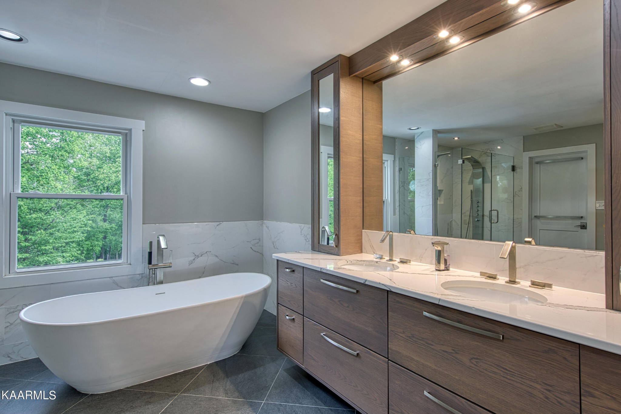 2313 Tooles Bend Road Knoxville, TN 37922 - Photo 32 of 50 a bathroom with a tub double sink and mirror