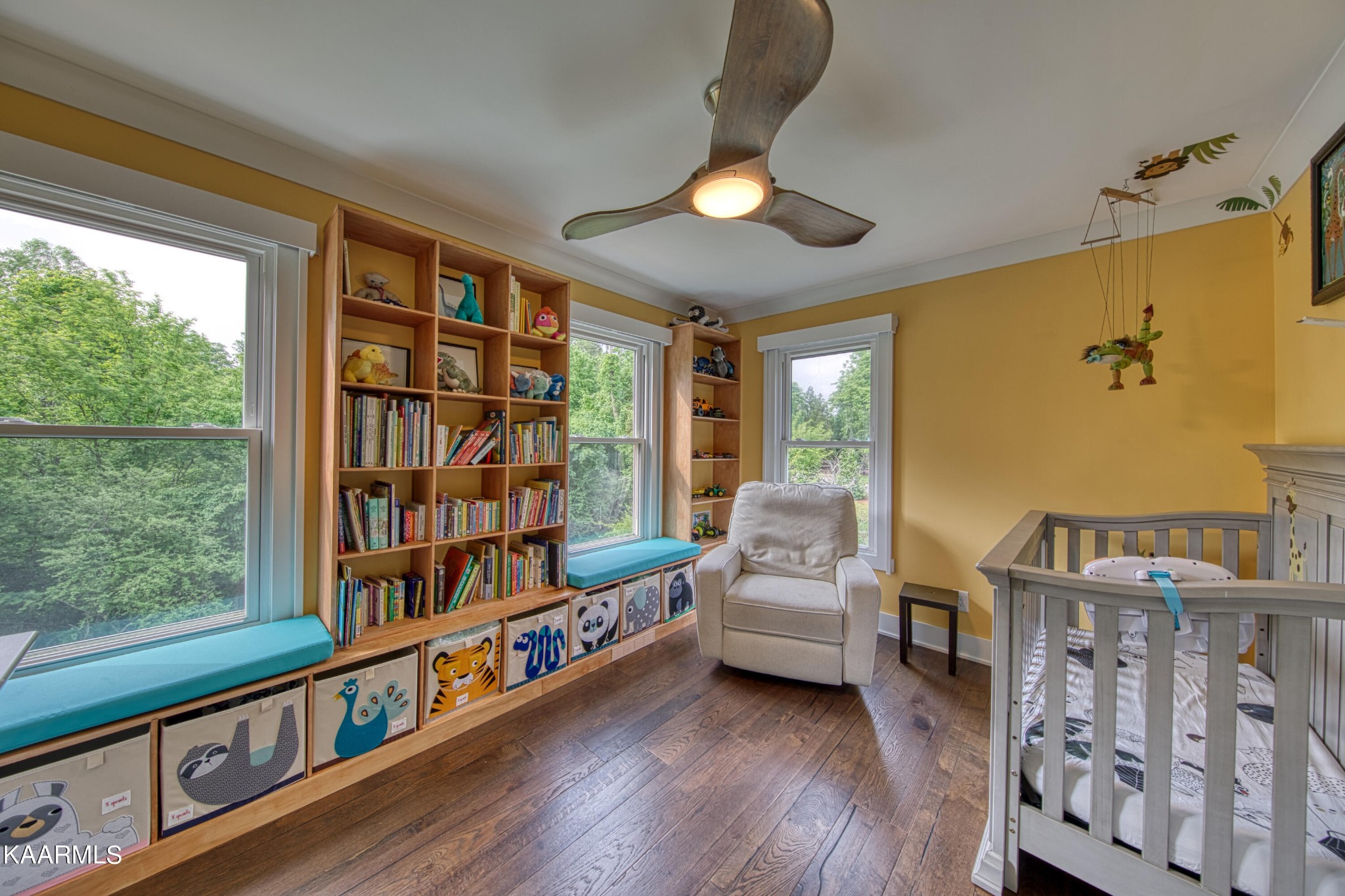 2313 Tooles Bend Road Knoxville, TN 37922 - Photo 38 of 50 a living room with furniture and a book shelf