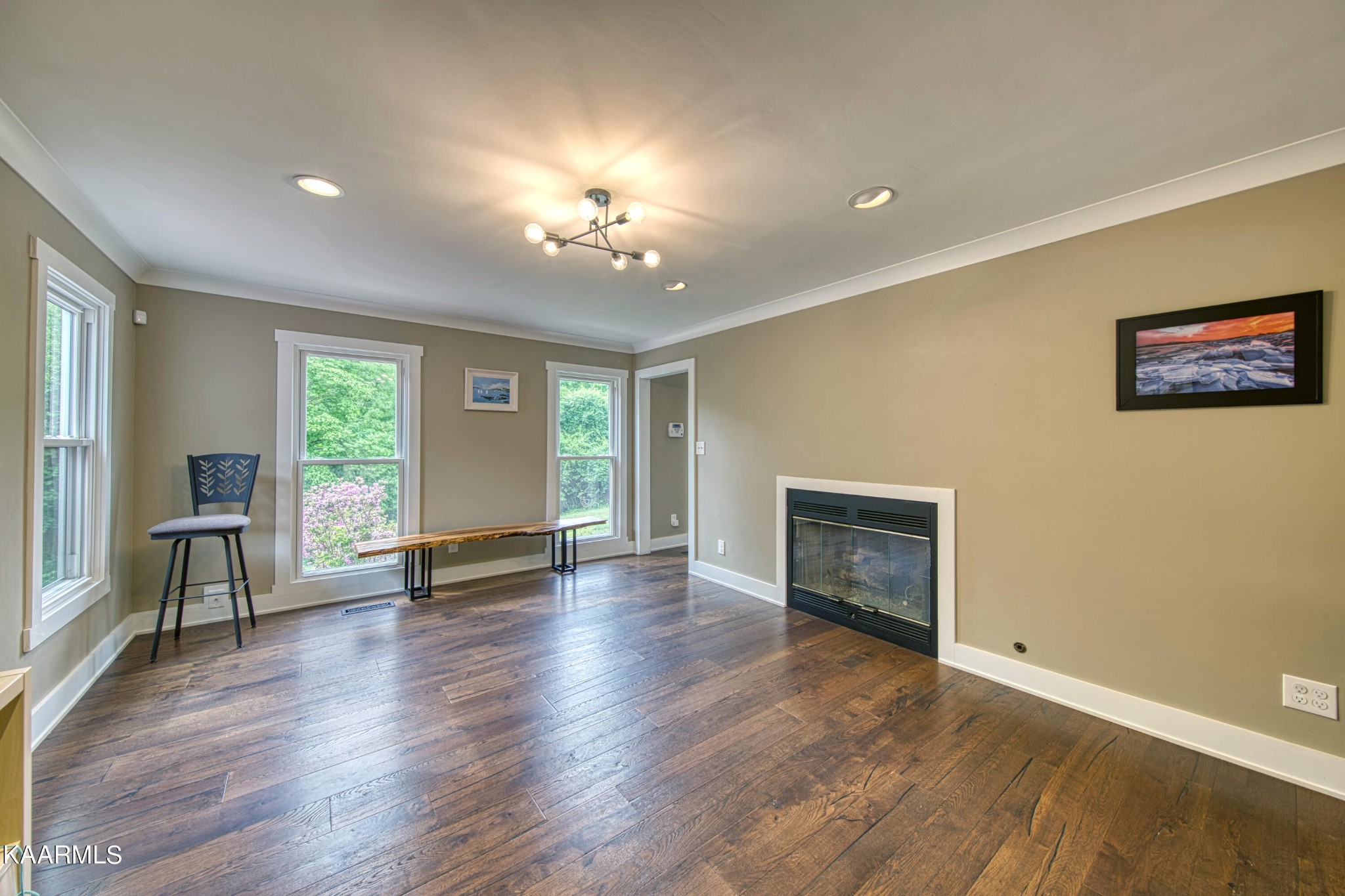 2313 Tooles Bend Road Knoxville, TN 37922 - Photo 9 of 50 a view of an empty room with a window and wooden floor
