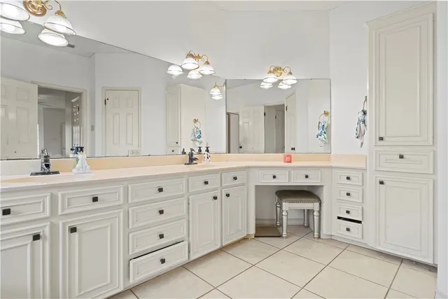 a bathroom with a shower and a sink