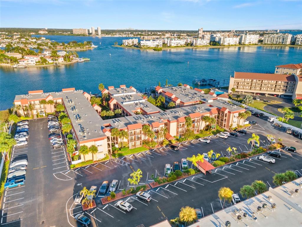 8921 Blind Pass Road, Unit 142 St. Pete Beach, FL 33706 - Photo 3 of 22 an aerial view of a city