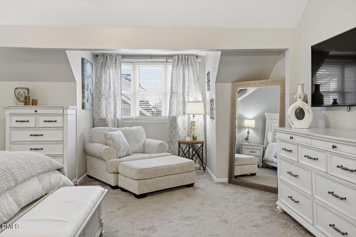 605 Oak Run Drive Raleigh, NC 27606 - Photo 20 of 28 a living room with furniture and a dresser