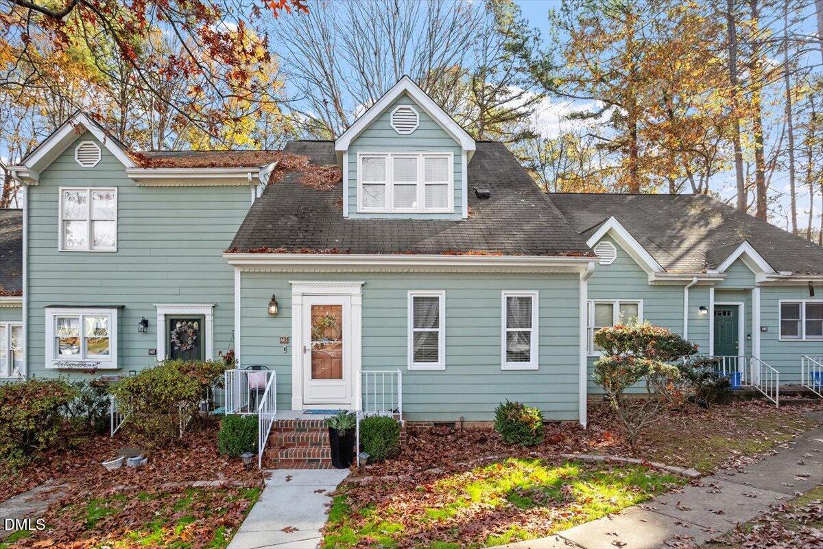 605 Oak Run Drive Raleigh, NC 27606 - Photo 27 of 28 a front view of a house with garden