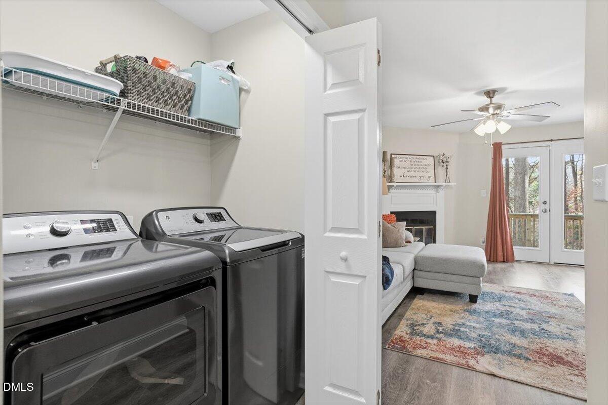 605 Oak Run Drive Raleigh, NC 27606 - Photo 7 of 28 a utility room with dryer and washer