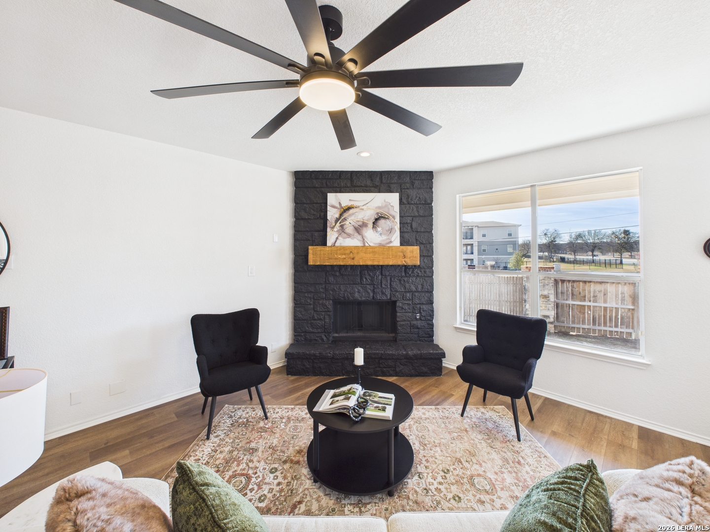 7202 Sandy Bay Converse, TX 78109 - Photo 14 of 40 a living room with furniture and a fireplace