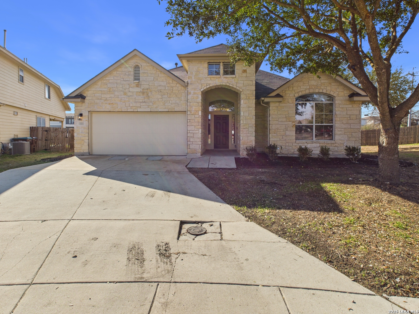 7202 Sandy Bay Converse, TX 78109 - Photo 2 of 40 a front view of a house with a yard