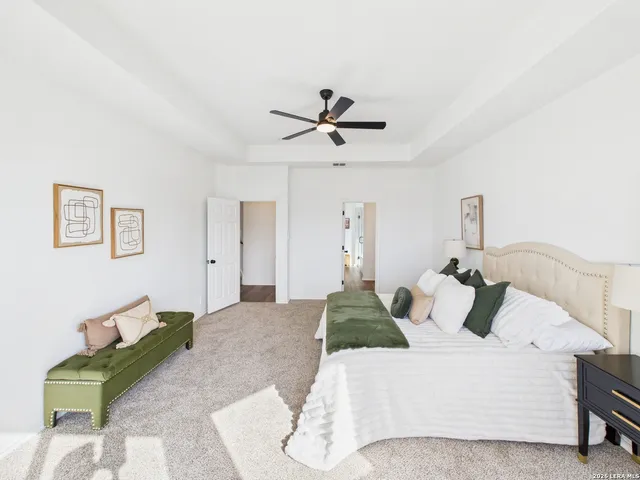 a living room with furniture and a lamp