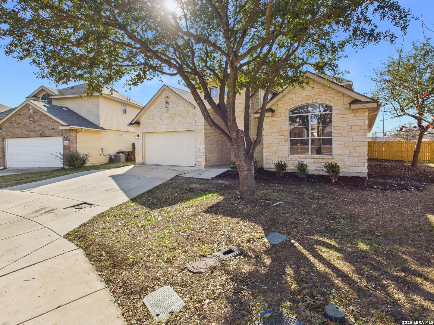 7202 Sandy Bay Converse, TX 78109 - Photo 3 of 40 a front view of a house with a yard