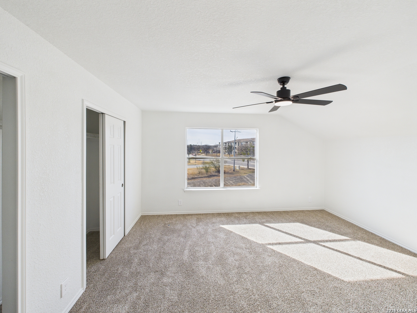 7202 Sandy Bay Converse, TX 78109 - Photo 31 of 40 a view of a livingroom with a ceiling fan and window
