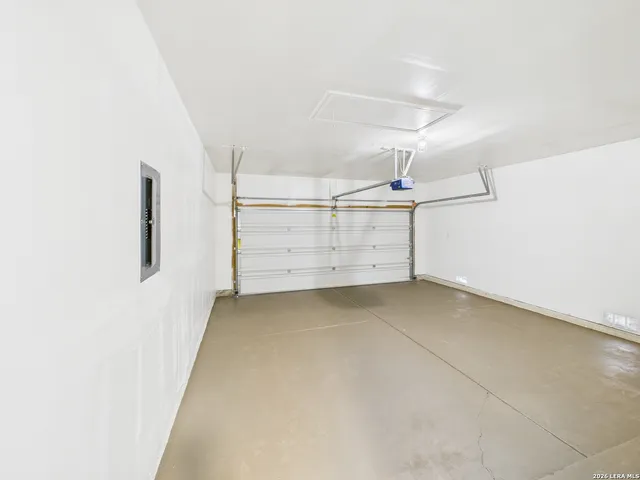 a view of storage and utility room with stairs