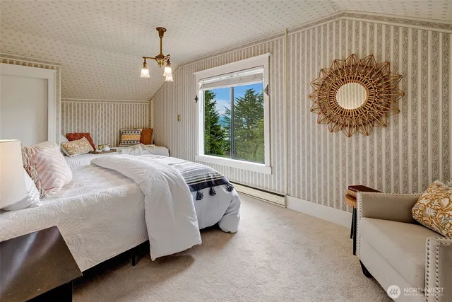 a bedroom with bed and window