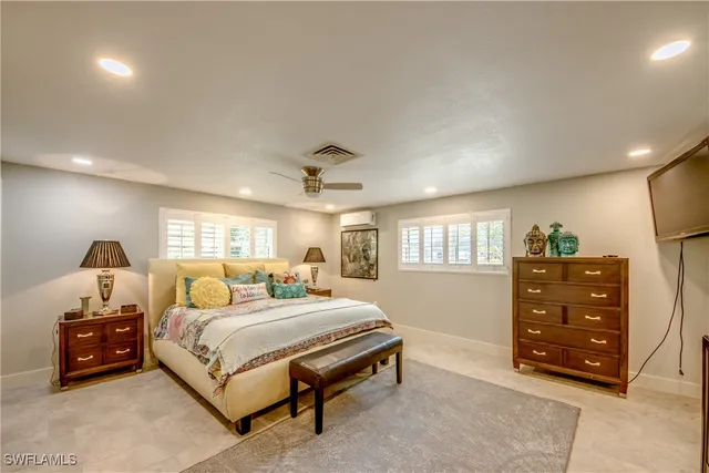 a view of a bathroom with a shower and a sink