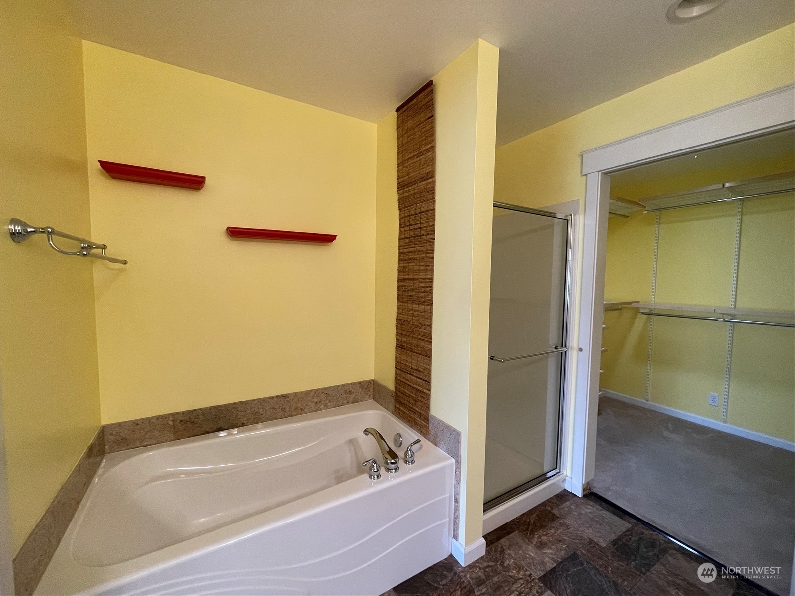 160 East Soderberg Road, Unit E15 Allyn, WA 98524 - Photo 21 of 33 a bathroom with a tub and shower