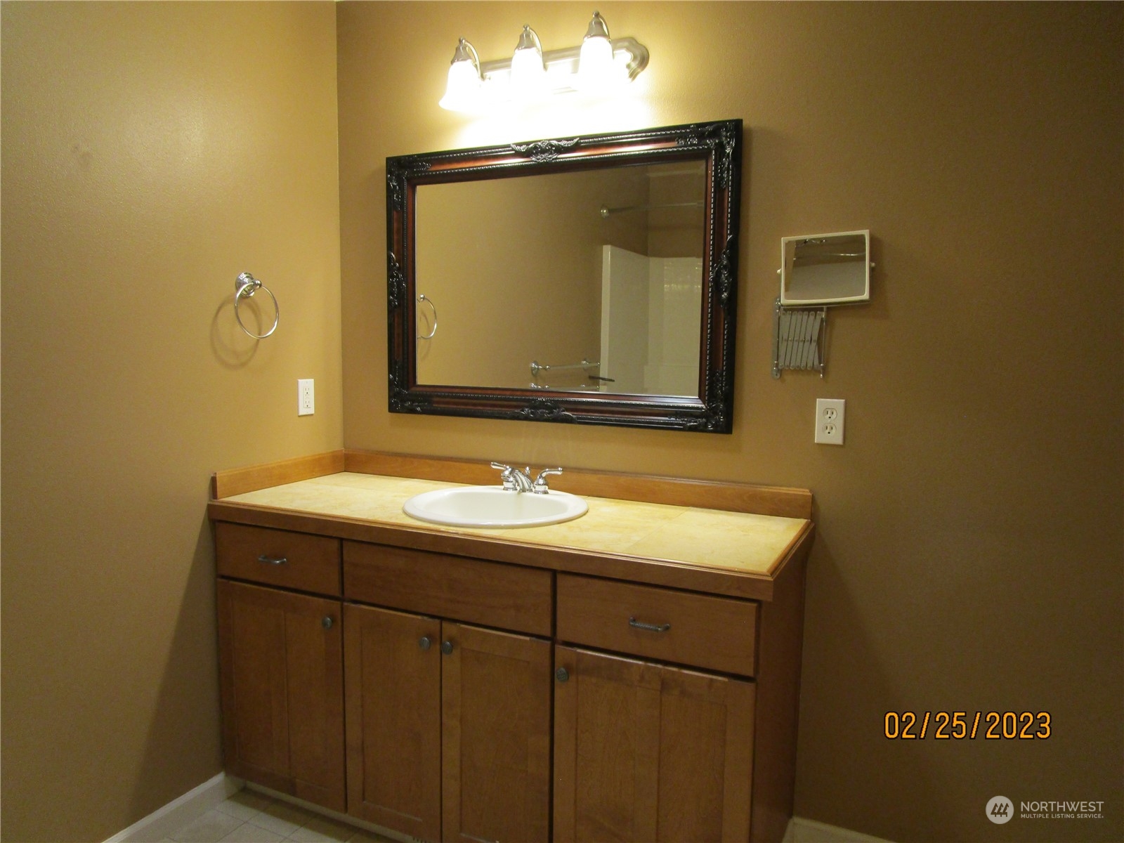160 East Soderberg Road, Unit E15 Allyn, WA 98524 - Photo 26 of 33 a bathroom with a sink and a mirror