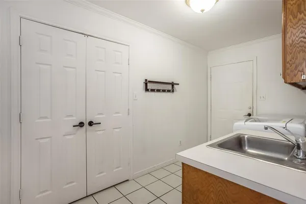 a bathroom with a sink and a shower