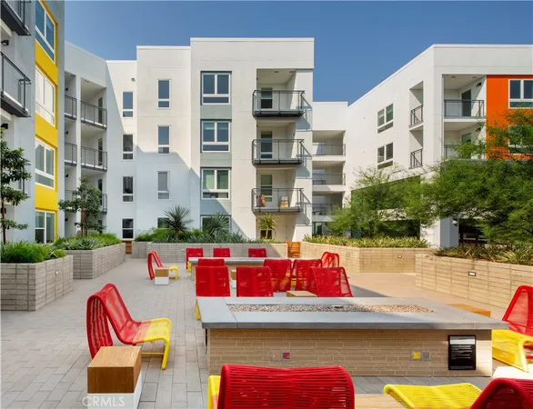 a view of building with outdoor seating