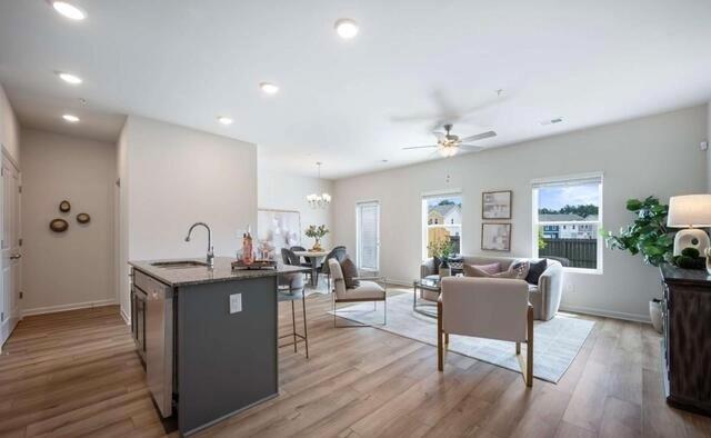 1380 Riverstone Road Jonesboro, GA 30238 - Photo 5 of 18 a view of a dining room with furniture window and wooden floor
