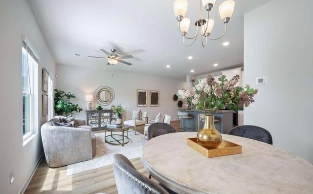 1380 Riverstone Road Jonesboro, GA 30238 - Photo 7 of 18 a view of a dining room with furniture