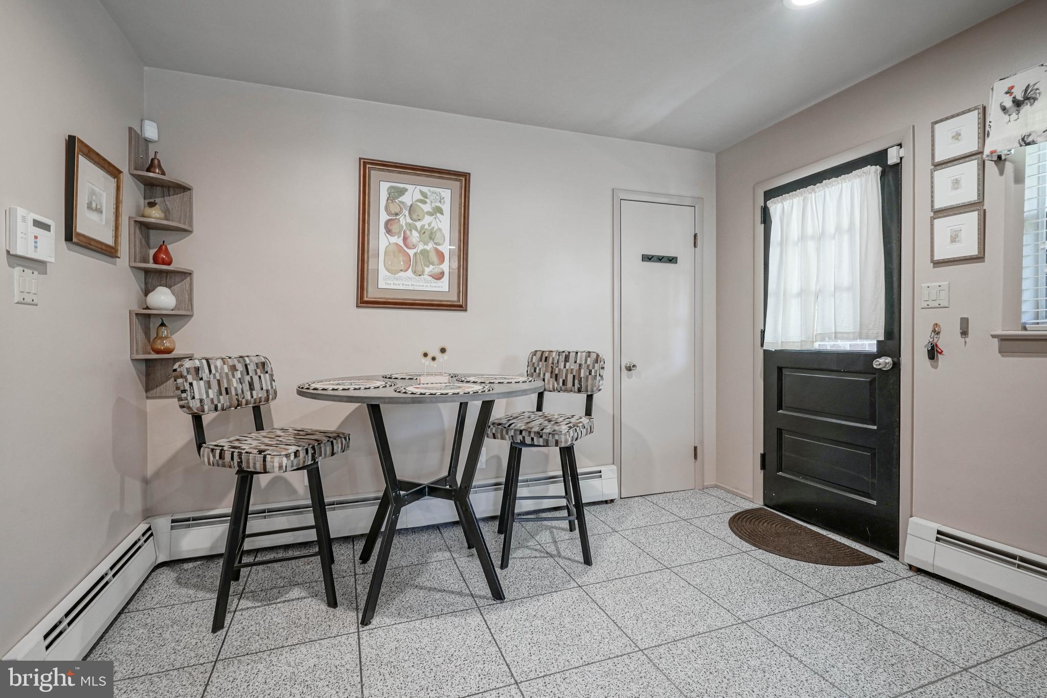 55 East Evesham Road Runnemede, NJ 08078 - Photo 11 of 45 a view of a dining room with furniture and window