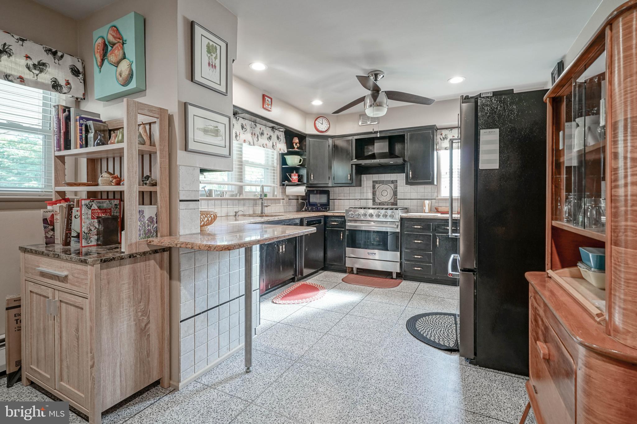 55 East Evesham Road Runnemede, NJ 08078 - Photo 12 of 45 a kitchen with stainless steel appliances granite countertop a sink and cabinets