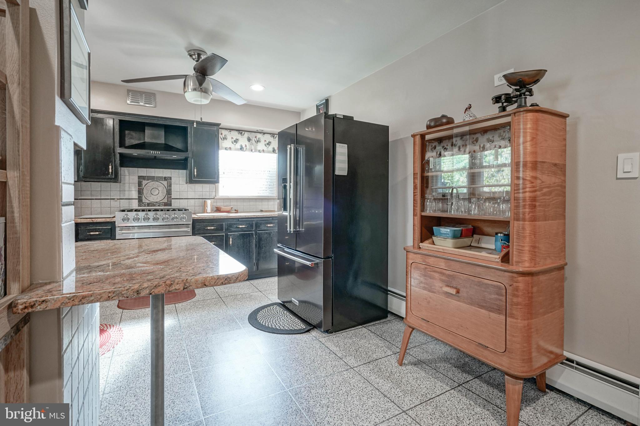 55 East Evesham Road Runnemede, NJ 08078 - Photo 13 of 45 a kitchen with stainless steel appliances granite countertop a refrigerator and a stove top oven