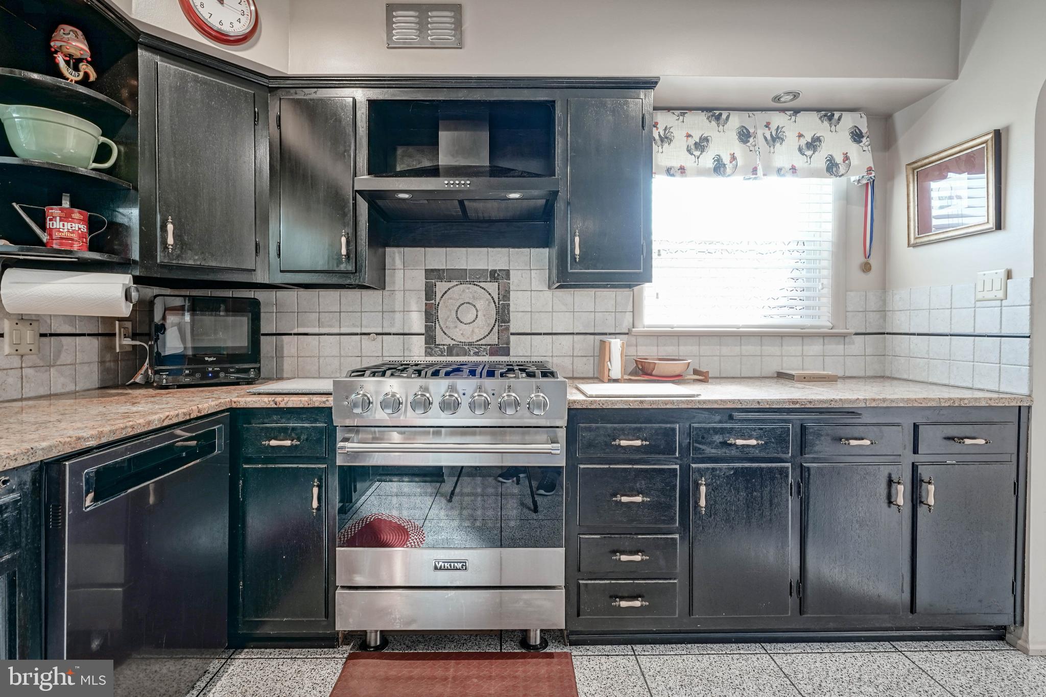 55 East Evesham Road Runnemede, NJ 08078 - Photo 14 of 45 a kitchen with stainless steel appliances granite countertop a stove and a sink