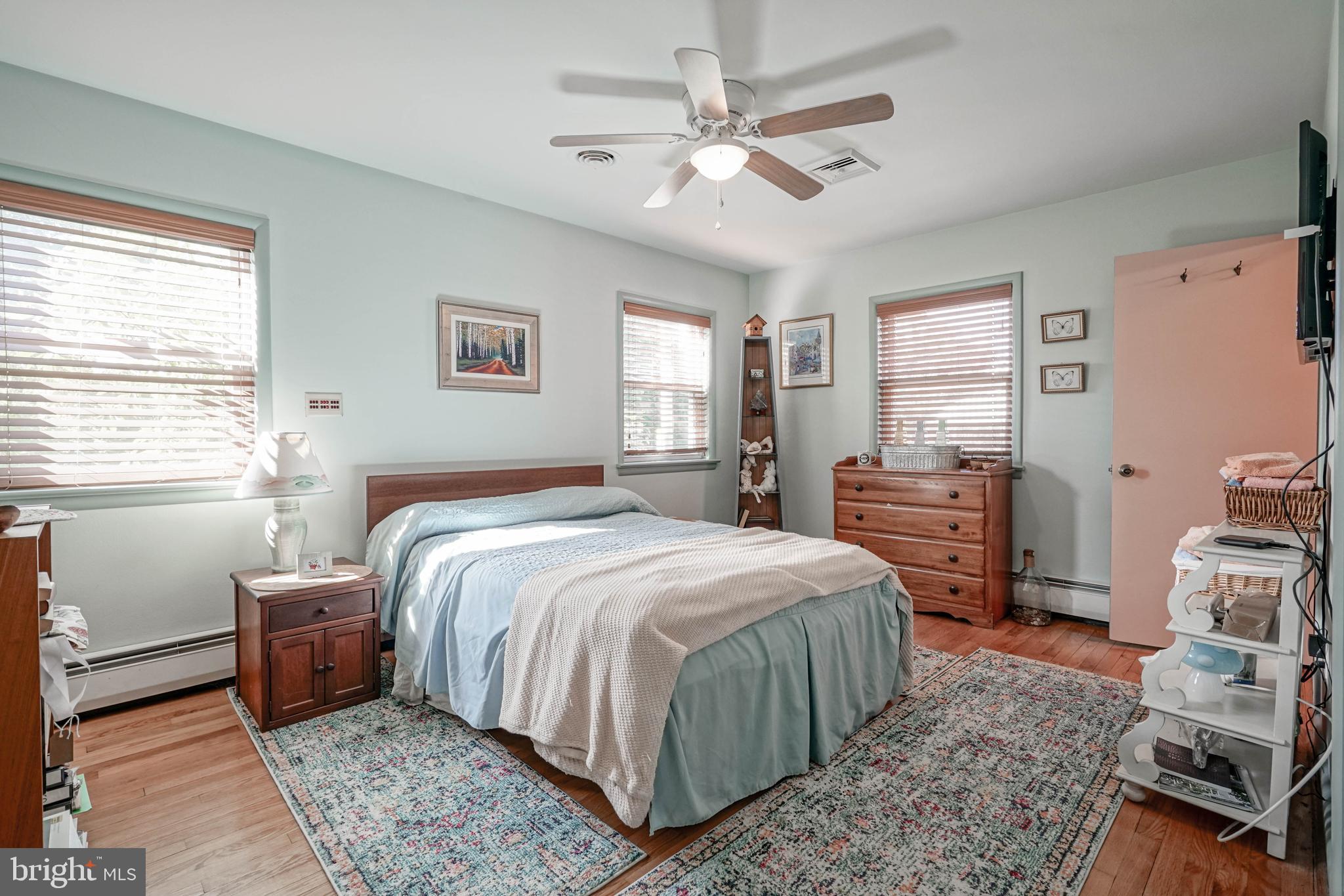 55 East Evesham Road Runnemede, NJ 08078 - Photo 18 of 45 a bedroom with a bed and a tv